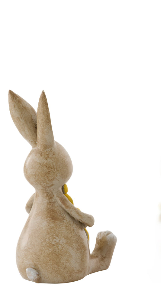 Coniglio con fiore giallo poliresina H. 15cm - J LINE by JOLIP